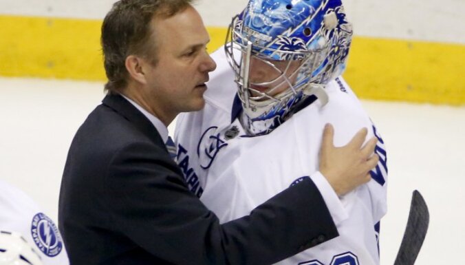 Tampa Bay Lightning coach Jon Cooper with goalie Andrei Vasilevskiy